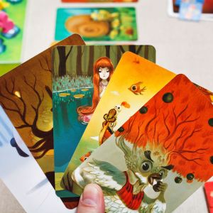 Dixit cards showcasing its art style.