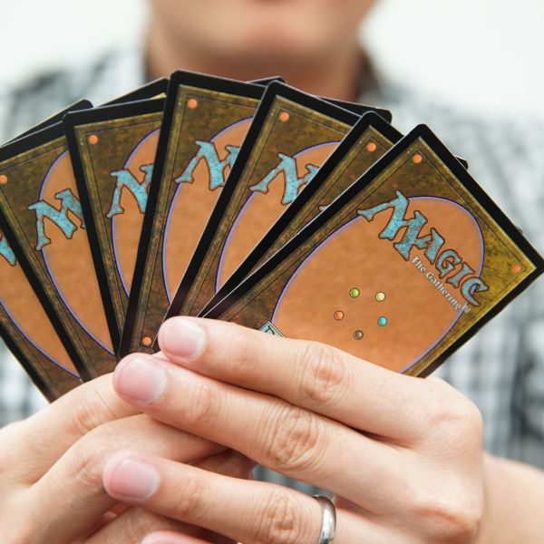 A hand of Houston MTG cards as part of a Houston Magic the Gathering Tournament